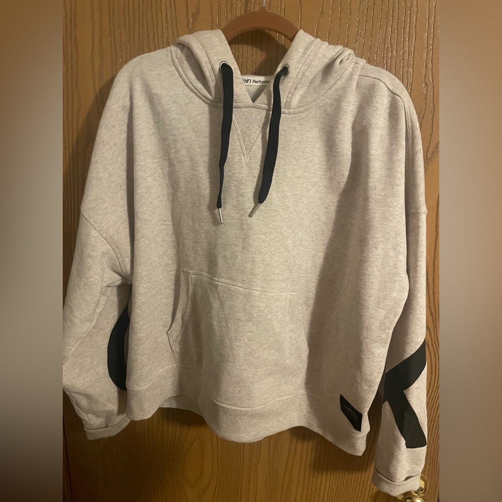 NWOT Calvin Klein Performance Cream Hoodie with Black Drawstring CK Sleeves